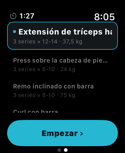 Lista de ejercicios de Musklr en Apple Watch entre ejercicios: Extensión de tríceps hacia abajo en polea con agarre en V seleccionada, 3 series de 12 a 14 con 37,5 kg, con el botón Empezar