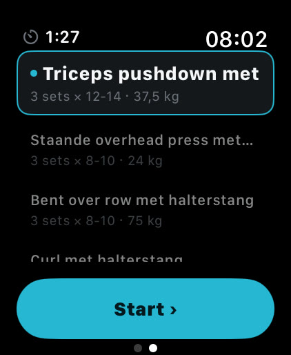 Lijst met oefeningen in Musklr op Apple Watch tussen twee oefeningen: Triceps pushdown met kabel en V-grip geselecteerd, 3 sets van 12 tot 14 met 37,5 kg, met een knop Start